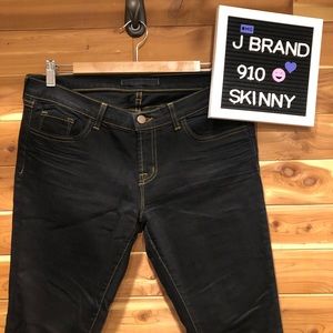 J brand 910 skinnies in black. Gold stitching!